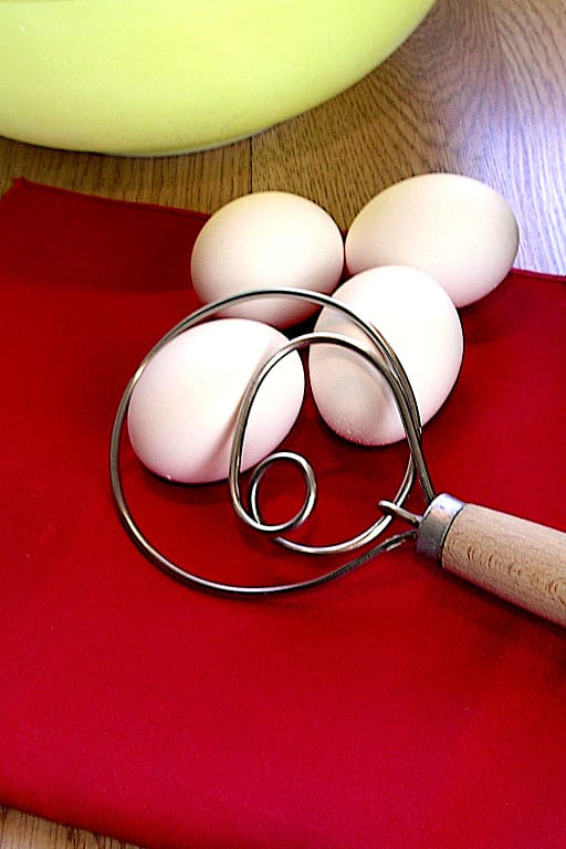 Danish whisk shown with eggs